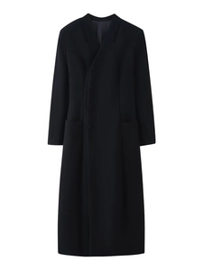 Detail view of black long wool coat featuring stand collar and side button waist cinching
