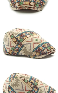Detailed close-up of colorful ethnic jacquard fabric on a vintage flat cap headwear