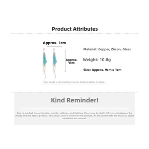 Detail view of crystal tassel earrings showing dimensions of 9cm by 1cm and weight