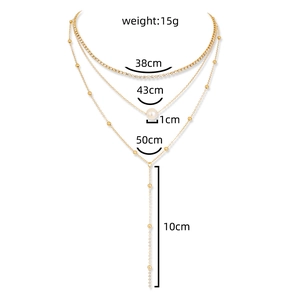 Detailed size parameters of multilayer gold necklace with pearls and tassel drop