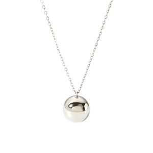 Polished silver stainless steel ball pendant necklace on a delicate chain in a studio setting