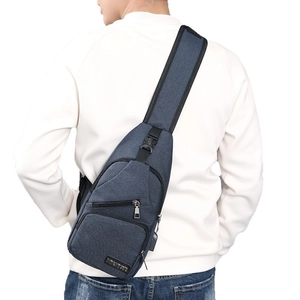 Men's navy blue nylon chest bag with multiple zipper pockets and adjustable strap