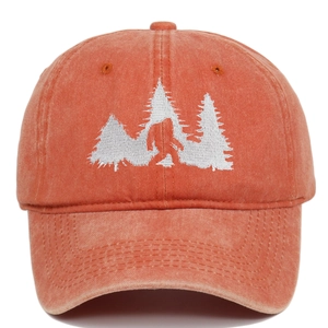 Close-up of Bigfoot embroidery and washed canvas texture on vintage baseball cap