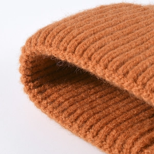 Winter orange ribbed knit beanie for men and women with thick thermal texture