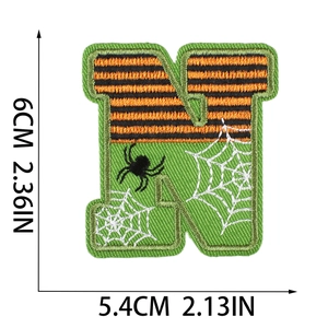 Detailed view of Halloween letter N embroidery patch with spider web motif and dimensions