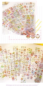 Detail of transparent cartoon stickers with cute characters and strawberry motifs