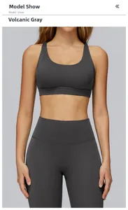 Detail of volcanic ash yoga set featuring a cross-back sports bra and high-waist leggings