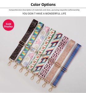 Detail of adjustable nylon bag straps with multiple colorful patterns and gold buckles