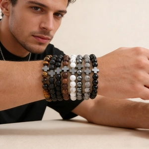 Natural volcanic stone bead bracelets for men featuring a metal cross charm and tiger eye beads