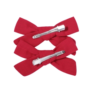 Set of two red textured cotton linen bow hair clips with silver metal alligator grips
