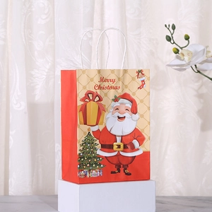 Weihnachts-Geschenktüte aus Kraftpapier mit Weihnachtsmann-Motiv und Tragegriffen