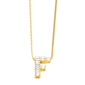 Detailed close-up of gold letter F pendant featuring baguette-cut sparkling zircon stones