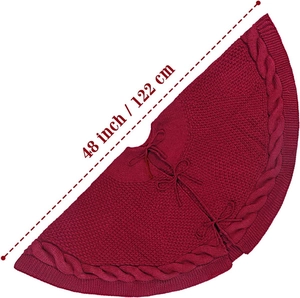 Classic 48 inch red cable knit Christmas tree skirt with festive bow tie closures