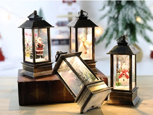 Macro detail of retro bronze Christmas lantern showing LED base and festive scenes