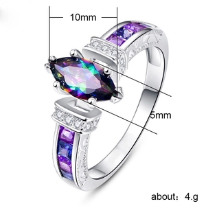 Rainbow marquise zircon ring with blue and purple side stones and floral relief pattern