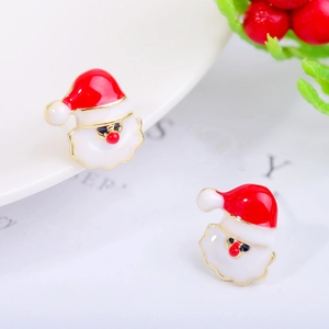 Detail of red and white Santa Claus stud earrings with gold plating and enamel finish