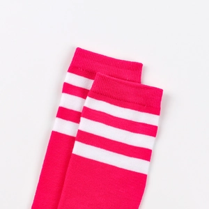 Detail view of fuchsia knee-high socks with three white stripes in JK college style
