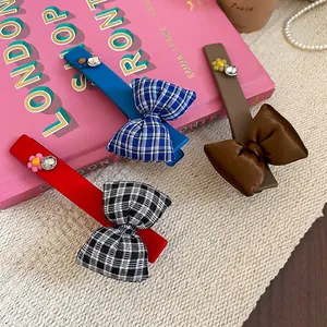 Floral bow hair clips with rhinestones in plaid and satin styles for women