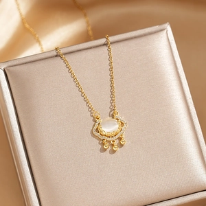 Collier chic en titane doré 18 carats avec pierre oeil de chat et zircons brillants