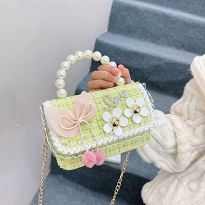 Green tweed kids handbag with pearl handle, pink bow and white floral detail