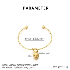 Polished gold stainless steel open bangle featuring a 12mm hollow spherical charm detail