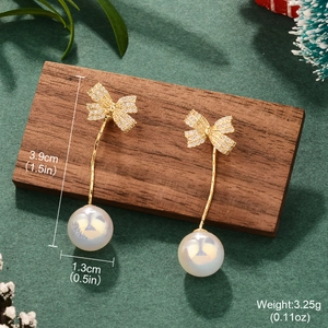 Detailed size specifications for gold bow earrings with pearls and dimensions in inches