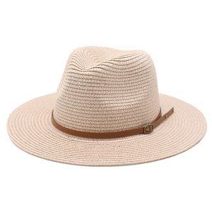 Classic beige wide brim straw Panama hat with brown leather band for summer sun protection