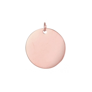 Close-up of a polished rose gold round zodiac pendant with small hanging loop