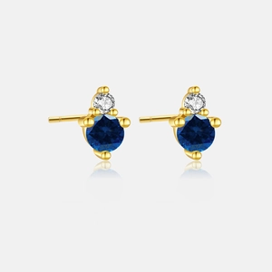 Detail view of S925 silver stud earrings with 3mm blue stone and gold plating finish