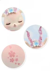 Detail of pink deer ornament with floral headpiece and cherry blossom prints