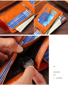 Detail view of brown leather wallet with multiple card slots and zipper coin pocket