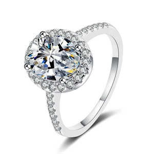 Classic 925 silver halo ring with a round moissanite center stone and pavé accents