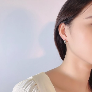 Minimalist S925 sterling silver water-drop stud earrings shown on model for women