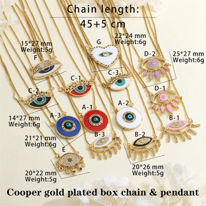 Detailed view of evil eye charms showing size specs and colorful enamel finishes