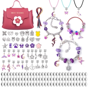 Pink handbag and DIY jewelry making kit with unicorn bracelets and colorful beads set
