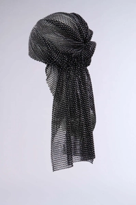 Close-up of black mesh headpiece with sparkling rhinestones for music festival outfits