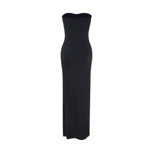 Detail of slim fit black strapless tube maxi dress with elegant ruched design