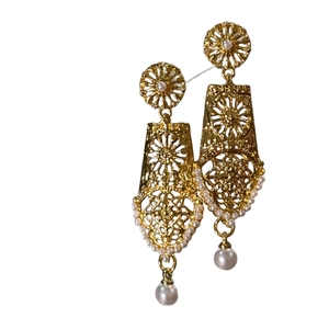 Elegant geometric hollow gold earrings with pearl pendants on a white background