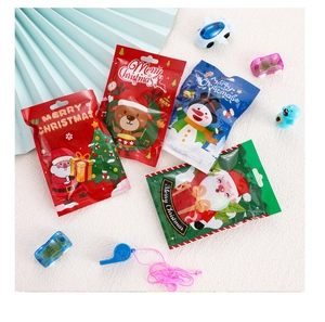 Detailed view of colorful Christmas stationery blind bags featuring Santa and reindeer designs