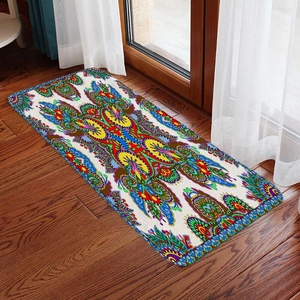 Close-up of mandala bohemian printed flannel rug on dark wooden floor with curtains