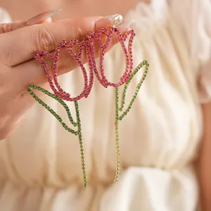 Elegant tulip tassel earrings with pink rhinestones and gold leaf details