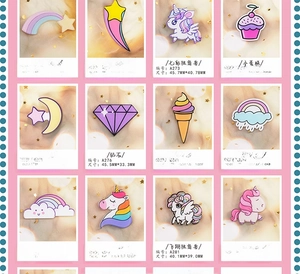 Detailed grid view showing diverse colorful unicorn and rainbow enamel badges set