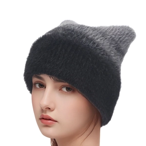 Close-up of dual-tone grey gradient knitted beanie with cute cat ear design and fuzzy texture