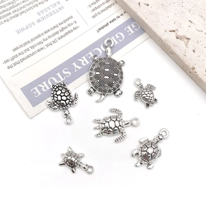 Set of vintage silver sea turtle pendants in various sizes for DIY jewelry making