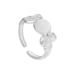 Detail of silver clover-shaped hollow geometric open ring made of durable stainless steel