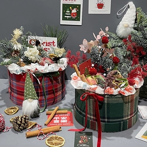 Christmas gift box set with plaid fabric round buckets, gnomes, and festive pine decor