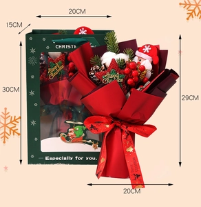 Detailed view of Christmas bouquet gift set with Santa doll and green windowed gift bag