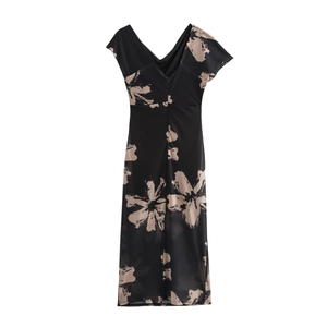 Robe longue sexy en résille fleurie noire et beige avec design asymétrique et coupe moulante