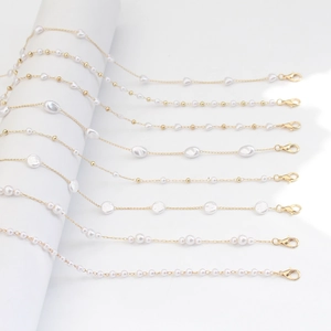 Elegant gold pearl eyewear chain collection featuring eight unique Baroque designs for women