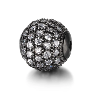 Macro detail of high-quality copper zircon bead with clear crystals for DIY jewelry making